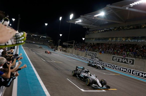 Lewis Hamilton leads Rosberg and Vettel over the line at the 2016 Abu Dhabi Grand Prix. Copyright: Mercedes AMG F1 Team.